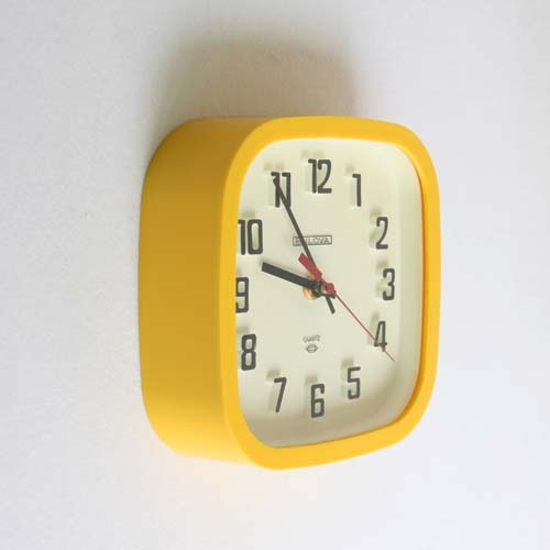vintage bulova yellow wall clock 