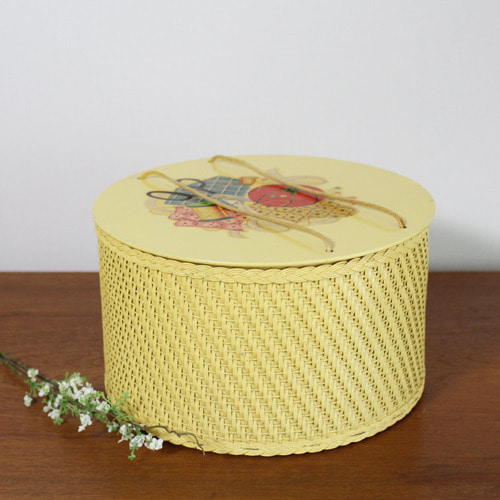 vintage yellow sewing basket